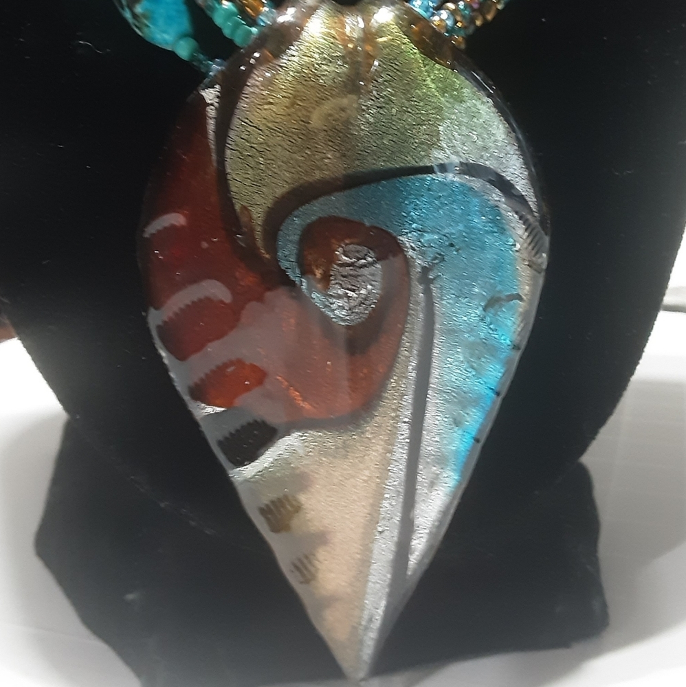Dramatic bead necklace, resin pendant.